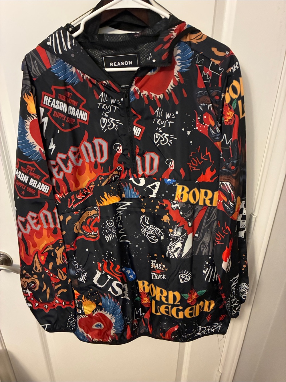 Reason Black Windbreaker Jacket with Red, Orange & Blue Graphic Print